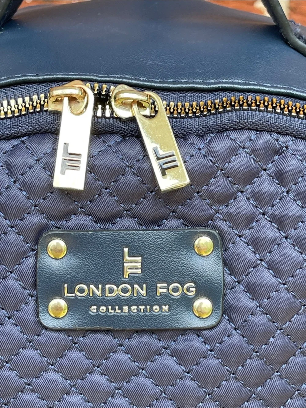 London Fog Quilted Navy Unisex Backpack with Gold Hardware